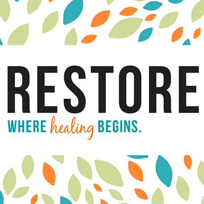RESTORE Where Healing Begins logo, multi colored leaves